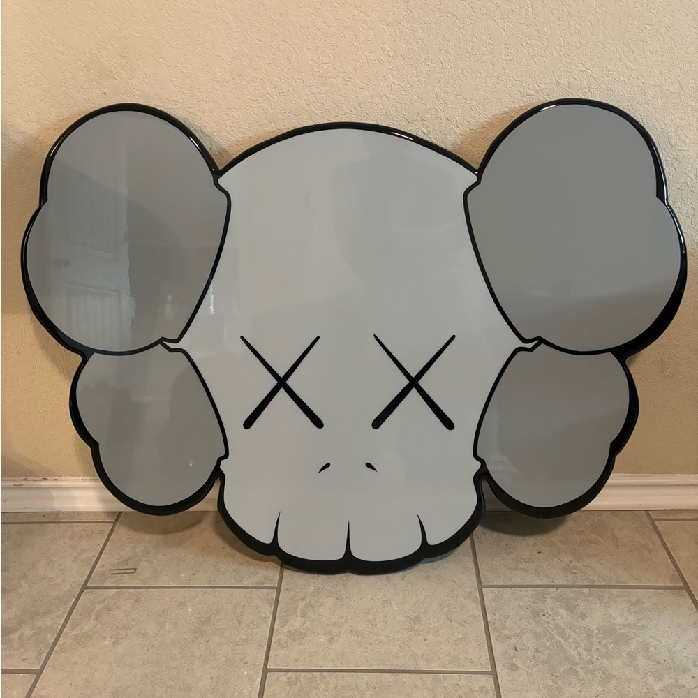kaws skull logo